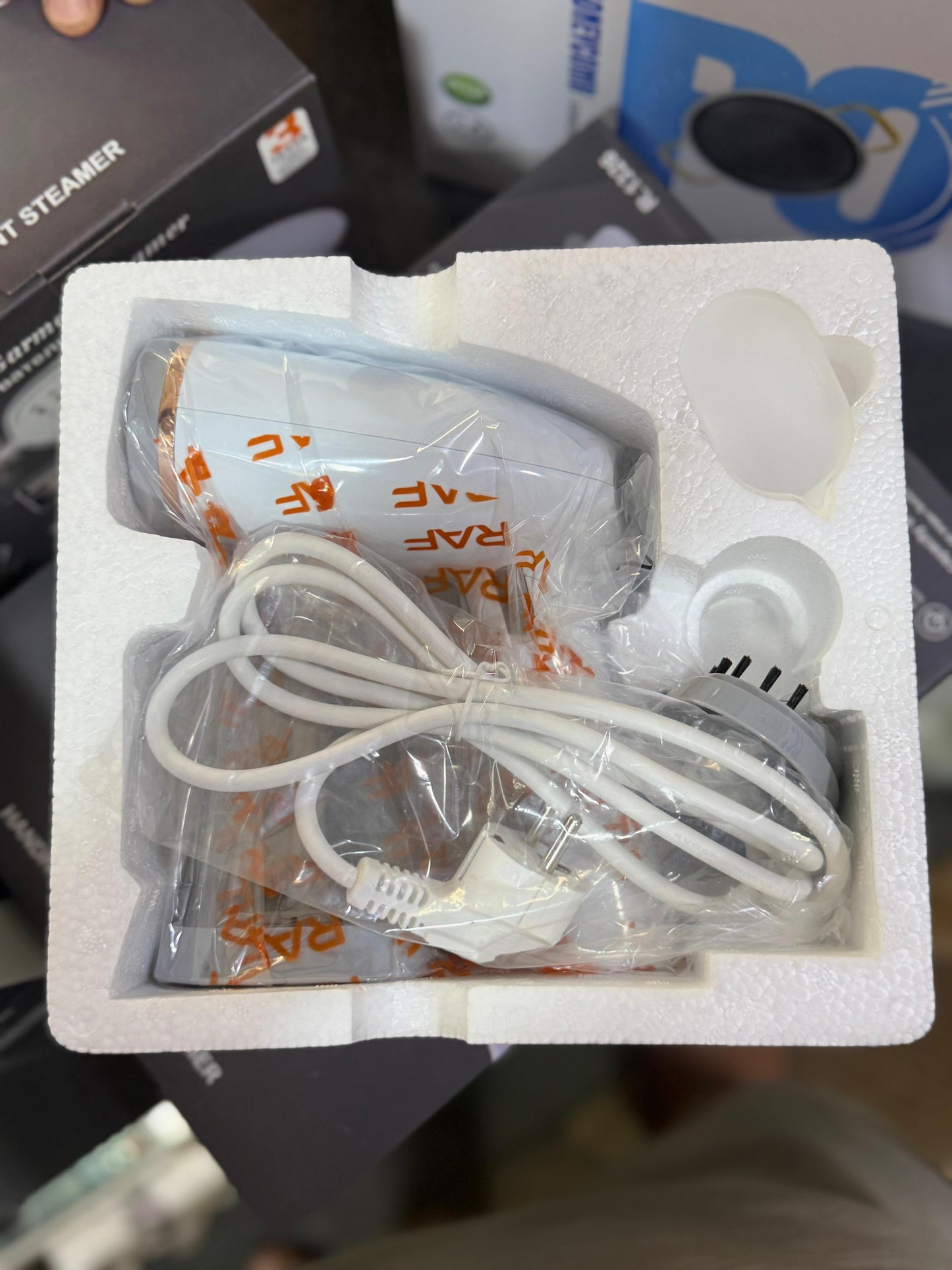 RAF hand held garment steamer