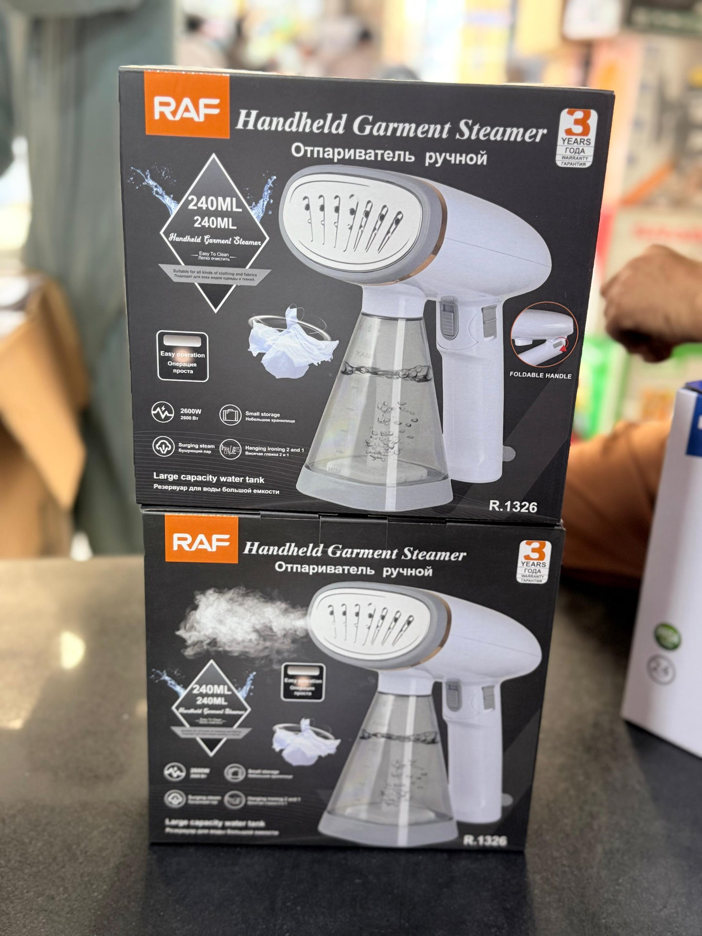 RAF hand held garment steamer